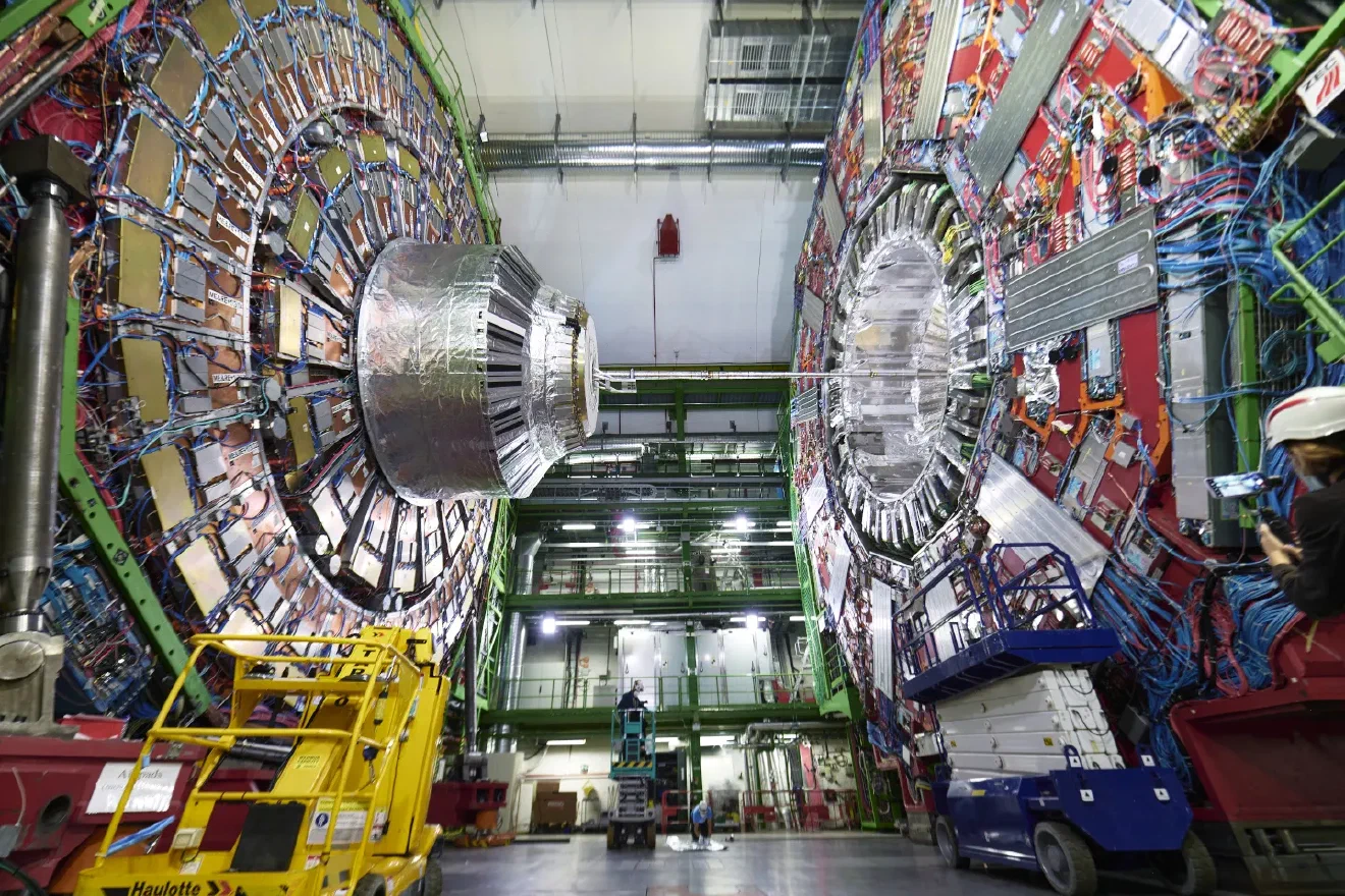The open CMS detector in its underground cavern at CERN